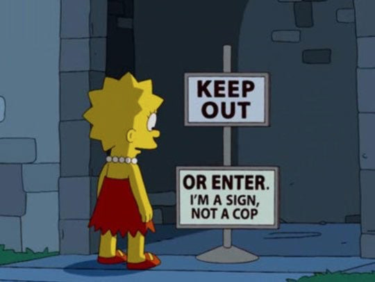 Image of Lisa Simpson in front of a sign saying "Keep out. Or enter, I'm a sign not a cop."