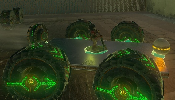 Screenshot from Zelda Tears of the Kingdom showing Link riding a four-wheeled board with a ball and a fan glued to it